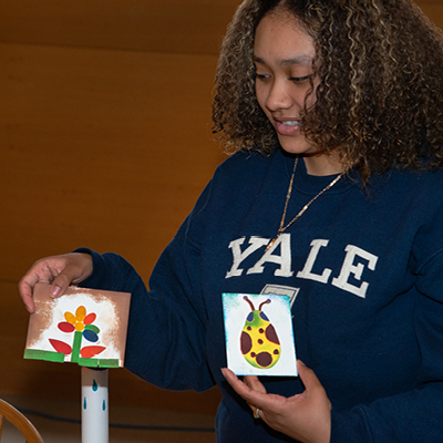 Educator demonstrating simple drawings